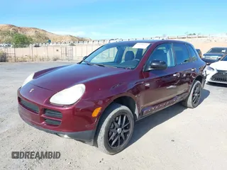 2004 Porsche Cayenne S with VIN WP1AB29P94LA64051, listed as a IAAI auction lot 41226699 with 130,947 mi miles. Bid and sale history available at carsss.com. Image 2.