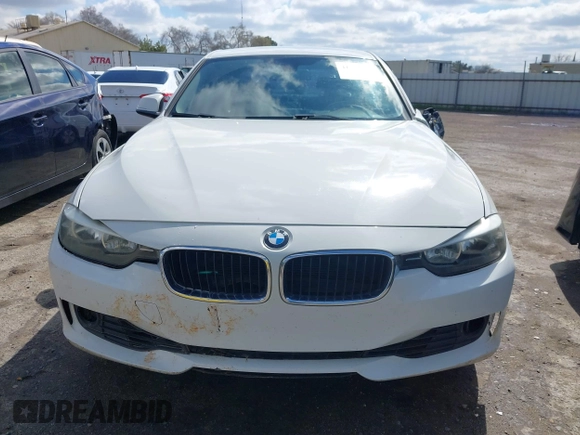 2015 BMW 3 Series 328i with VIN WBA3C1C5XFK117788, listed as a IAAI auction lot 41752178 with 154,030 mi miles and . Bid and sale history available at carsss.com. Image 12.