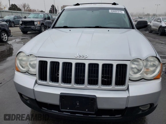 2009 Jeep Grand Cherokee Laredo with VIN 1J8HR48P19C555965, listed as a Copart auction lot 45602315 with 110,762 mi miles and Salvage Title. Bid and sale history available at carsss.com. Image 5.