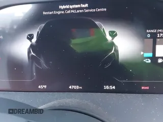 2023 McLaren Artura z VIN SBM16AEA4PW001449, wystawiony jako IAAI lot #41347791 z przebiegiem 4703 mil mil oraz . Historia ofert i sprzedaży dostępna na DreamBid. Obrazek 15.