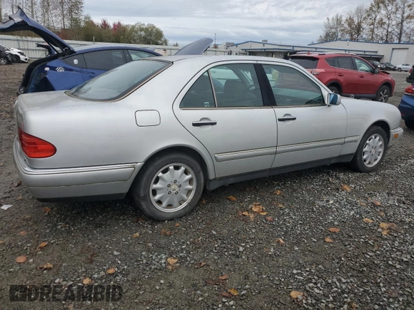 1999 Mercedes-Benz E-Class with VIN WDBJF65H5XA906877, listed as a Copart auction lot 76156014 with 141,956 mi miles and Clean Title. Bid and sale history available at carsss.com. Image 3.