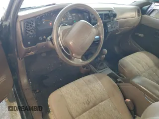 1999 Toyota Tacoma with VIN 4TAPM62N9XZ555738, listed as a Copart auction lot 78293634 with 210,096 mi miles and Salvage Title. Bid and sale history available at DreamBid. Image 8.