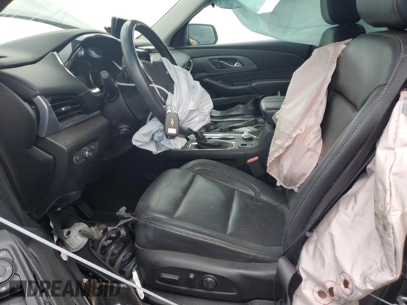 2021 Chevrolet Traverse Premier with VIN 1GNERKKW2MJ262862, listed as a Copart auction lot 58779765 with 76,927 mi miles and Salvage title. Bid and sale history available at DreamBid. Image 7.