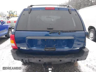 2001 Jeep Grand Cherokee Laredo with VIN 1J4GW48N21C730703, listed as a IAAI auction lot 41581667 with 111,054 mi miles. Bid and sale history available at carsss.com. Image 17.