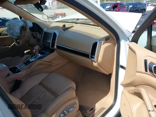 2014 Porsche Cayenne with VIN WP1AA2A20ELA02638, listed as a IAAI auction lot 42349570 with 113,355 mi miles and . Bid and sale history available at DreamBid. Image 5.