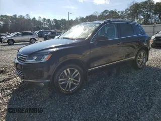 2015 Volkswagen Touareg Sport with VIN WVGEF9BP1FD003120, listed as a Copart auction lot 86053114 with 189,561 mi miles and Salvage title. Bid and sale history available at DreamBid. Image 1.
