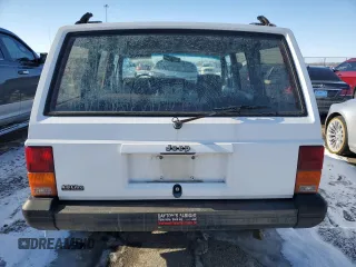 1994 Jeep Cherokee Sport with VIN 1J4FJ68S5RL135545, listed as a Copart auction lot 42397255 with 199,054 mi miles and Salvage Title. Bid and sale history available at carsss.com. Image 6.