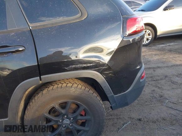 2015 Jeep Cherokee Latitude with VIN 1C4PJMCS0FW745949, listed as a IAAI auction lot 41289847 with 137,440 mi miles and . Bid and sale history available at carsss.com. Image 17.