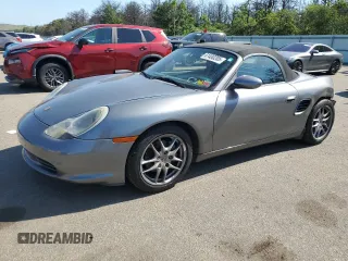 2003 Porsche Boxster with VIN WP0CA29873U620128, listed as a Copart auction lot 61400205 with 48,956 mi miles and Salvage title. Bid and sale history available at DreamBid. Image 1.