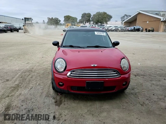 2009 MINI Hardtop with VIN WMWMF33519TW77558, listed as a Copart auction lot 54556785 with 97,749 mi miles and Salvage Title. Bid and sale history available at DreamBid. Image 14.