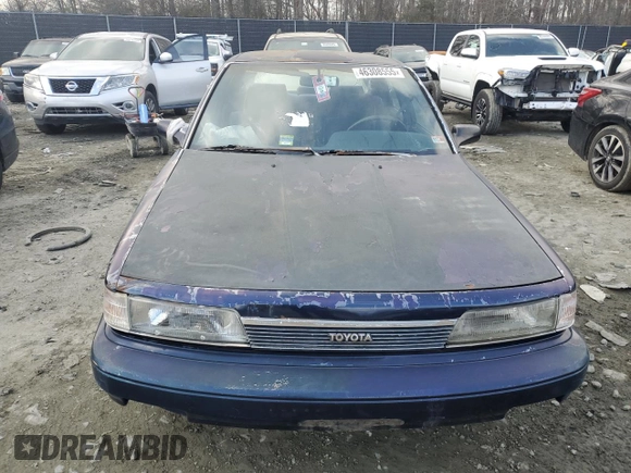 1989 Toyota Camry z VIN 4T1SV22E0KU032677, wystawiony jako Copart lot #46308555 z przebiegiem 993 896 mil mil oraz Czysty tytuł • Clean title. Historia ofert i sprzedaży dostępna na DreamBid. Obrazek 5.