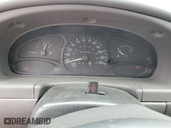1998 Ford Escort SE z VIN 1FAFP13P6WW252979, wystawiony jako Copart lot #55183844 z przebiegiem 217 731 mil mil oraz Szkoda całkowita • Salvage title. Historia ofert i sprzedaży dostępna na DreamBid. Obrazek 9.