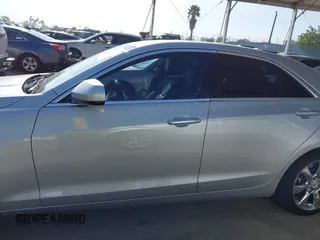 2014 Cadillac ATS Standard RWD with VIN 1G6AA5RXXE0110031, listed as a IAAI auction lot 42100955 with 82,109 mi miles. Bid and sale history available at carsss.com. Image 15.