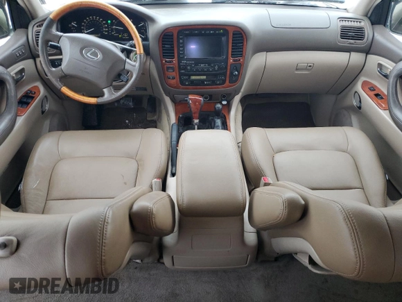 2002 Lexus LX 470 z VIN JTJHT00W923514121, wystawiony jako Copart lot #87761105 z przebiegiem 247 752 mil mil oraz Szkody całkowita. Historia ofert i sprzedaży dostępna na DreamBid. Obrazek 8.