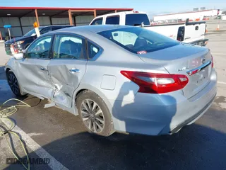 2018 Nissan Altima 2.5 SV with VIN 1N4AL3APXJC265944, listed as a IAAI auction lot 41052902 with 142,023 mi miles. Bid and sale history available at carsss.com. Image 3.