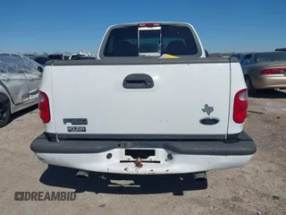 2001 Ford F-150 XL with VIN 2FTZF07221CA45965, listed as a IAAI auction lot 41621617 with 190,372 mi miles. Bid and sale history available at carsss.com. Image 8.