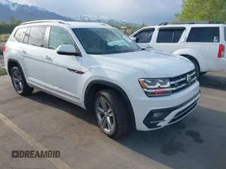 2018 Volkswagen Atlas SE with VIN 1V2FR2CA2JC540657, listed as a IAAI auction lot 42115554 with 107,309 mi miles and . Bid and sale history available at DreamBid. Image 1.