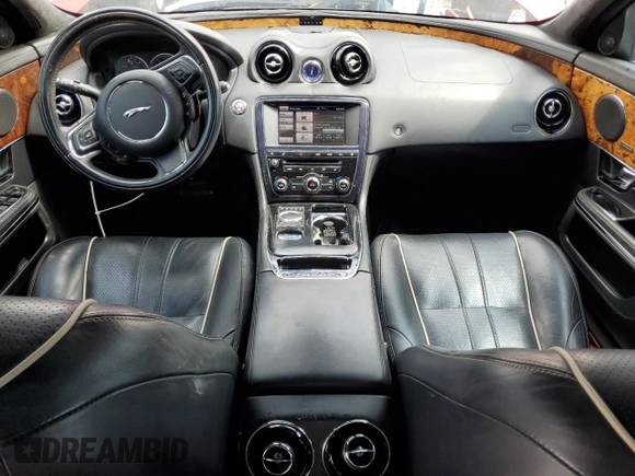 2013 Jaguar XJ with VIN SAJWJ1CD9D8V48888, listed as a Copart auction lot 62272685 with 166,533 mi miles and Clean title. Bid and sale history available at DreamBid. Image 8.