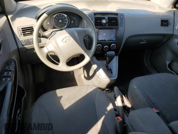 2009 Hyundai Tucson GLS with VIN KM8JM12B29U953176, listed as a Copart auction lot 70141174 with 77,132 mi miles and Salvage Title. Bid and sale history available at carsss.com. Image 8.