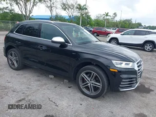 2018 Audi SQ5 Premium Plus z VIN WA1A4AFY6J2009085, wystawiony jako IAAI lot #42410933 z przebiegiem 59 773 mil mil oraz . Historia ofert i sprzedaży dostępna na DreamBid. Obrazek 1.