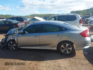 2020 Honda Civic LX z VIN 2HGFC2F60LH549739, wystawiony jako IAAI lot #40922240 z przebiegiem 127 958 mil mil oraz . Historia ofert i sprzedaży dostępna na DreamBid. Obrazek 14.