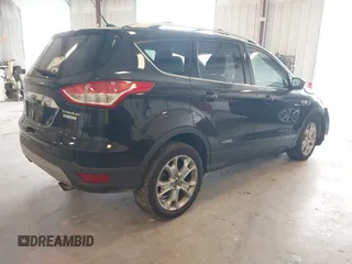 2014 Ford Escape Titanium с VIN 1FMCU0J9XEUA90770, выставлен на аукционе IAAI как лот 42354947 с пробегом 96 296 миль миль и . История ставок и продаж доступна на DreamBid. Изображение 4.