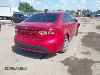 2021 Toyota Corolla LE with VIN 5YFEPMAE4MP168772, listed as a IAAI auction lot 39918982 with 84,699 mi miles. Bid and sale history available at carsss.com. Image 4.