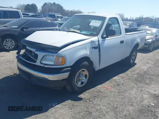 2002 Ford F-150 XL with VIN 1FTRF172X2NC07830, listed as a IAAI auction lot 41584706 with 143,255 mi miles. Bid and sale history available at carsss.com. Image 2.