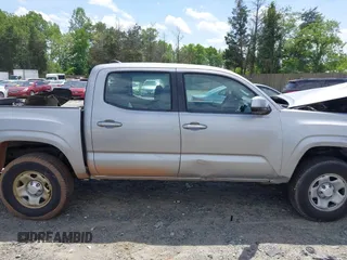 2017 Toyota Tacoma SR5 z VIN 3TMCZ5ANXHM109312, wystawiony jako IAAI lot #42126294 z przebiegiem 82 988 mil mil oraz . Historia ofert i sprzedaży dostępna na DreamBid. Obrazek 14.