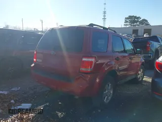 2011 Ford Escape XLT with VIN 1FMCU0D76BKB89698, listed as a IAAI auction lot 41073661 with 124,479 mi miles. Bid and sale history available at carsss.com. Image 4.