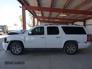 2014 Chevrolet Suburban LT with VIN 1GNSCJE04ER230536, listed as a IAAI auction lot 41666737 with 152,812 mi miles. Bid and sale history available at carsss.com. Image 14.