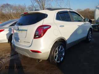 2017 Buick Encore Essence with VIN KL4CJCSB0HB059182, listed as a IAAI auction lot 41738135 with 110,887 mi miles and . Bid and sale history available at carsss.com. Image 4.
