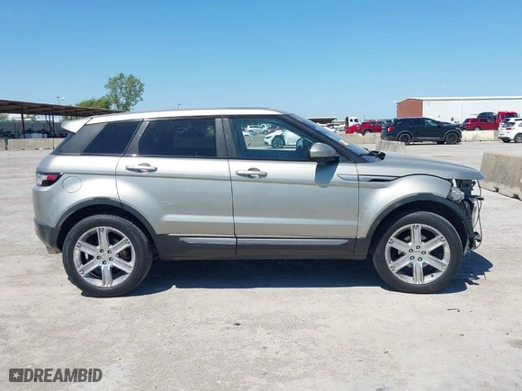 2014 Land Rover Range Rover Evoque Pure Plus with VIN SALVP2BG4EH891497, listed as a IAAI auction lot 40355156 with 93,424 mi miles. Bid and sale history available at carsss.com. Image 14.