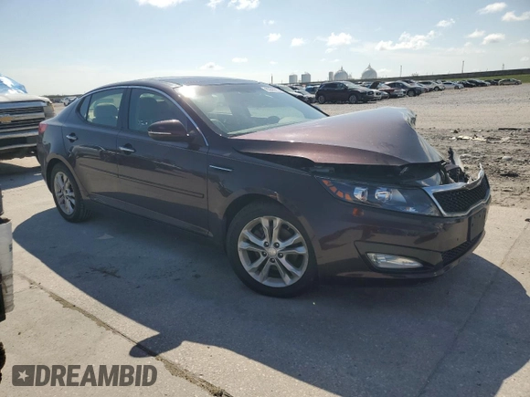 2013 Kia Optima EX z VIN 5XXGN4A70DG186128, wystawiony jako Copart lot #65836315 z przebiegiem 124 488 mil mil oraz Czysty tytuł • Clean title. Historia ofert i sprzedaży dostępna na DreamBid. Obrazek 4.