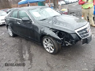 2016 Cadillac ATS Standard AWD z VIN 1G6AG5RX2G0180060, wystawiony jako IAAI lot #41468648 z przebiegiem 41 879 mil mil oraz . Historia ofert i sprzedaży dostępna na DreamBid. Obrazek 1.