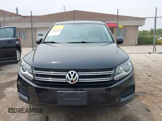 2013 Volkswagen Tiguan S with VIN WVGAV3AX2DW594334, listed as a IAAI auction lot 42405989 with 96,559 mi miles and . Bid and sale history available at DreamBid. Image 12.