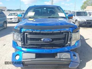 2013 Ford F-150 XL with VIN 1FTFW1CF2DFD94327, listed as a IAAI auction lot 41817344 with 292,491 mi miles and . Bid and sale history available at DreamBid. Image 6.