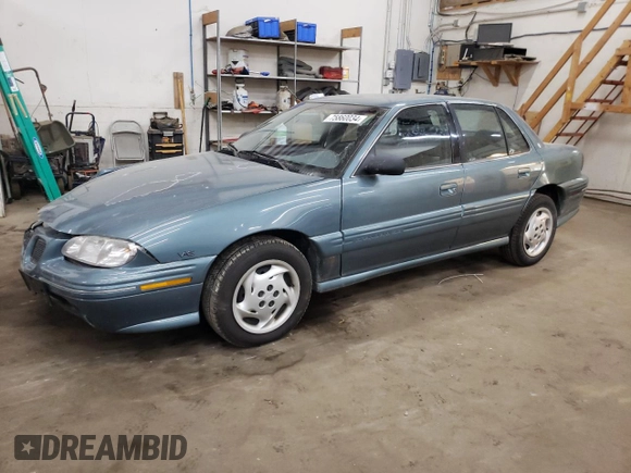 1997 Pontiac Grand Am SE with VIN 1G2NE52M8VC721326, listed as a Copart auction lot 75860034 with 110,209 mi miles and Salvage title. Bid and sale history available at DreamBid. Image 1.