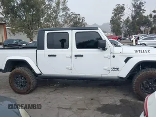 2021 Jeep Gladiator Willys с VIN 1C6HJTAG6ML619730, выставлен на аукционе IAAI как лот 41172494 с пробегом 40 360 миль миль и . История ставок и продаж доступна на DreamBid. Изображение 13.