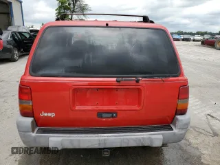 1997 Jeep Grand Cherokee Laredo with VIN 1J4GZ58S3VC770085, listed as a Copart auction lot 57584684 with 0 mi miles and Clean Title. Bid and sale history available at carsss.com. Image 6.