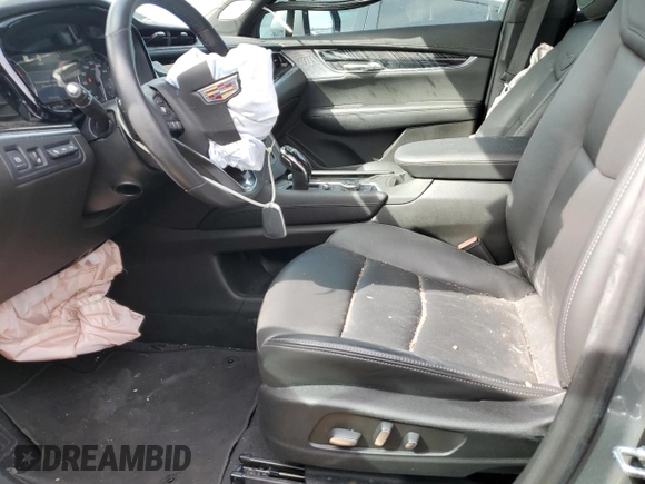 2023 Cadillac XT6 FWD Premium Luxury with VIN 1GYKPCRS4PZ124119, listed as a Copart auction lot 87836515 with 14,752 mi miles and Salvage title. Bid and sale history available at DreamBid. Image 7.