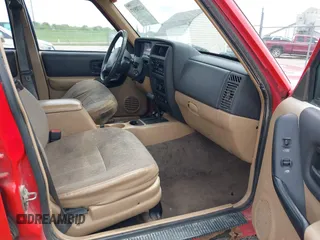 1999 Jeep Cherokee Sport with VIN 1J4FT68S6XL511158, listed as a IAAI auction lot 42170917 with 251,442 mi miles and . Bid and sale history available at DreamBid. Image 5.