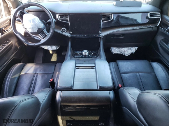 2023 Jeep Grand Wagoneer Series II Obsidian with VIN 1C4SJVFJ7PS530192, listed as a Copart auction lot 79361124 with 33,730 mi miles and Salvage Title. Bid and sale history available at carsss.com. Image 8.