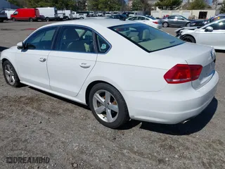 2012 Volkswagen Passat SE with VIN 1VWBP7A38CC030837, listed as a IAAI auction lot 41864669 with 169,816 mi miles. Bid and sale history available at carsss.com. Image 3.