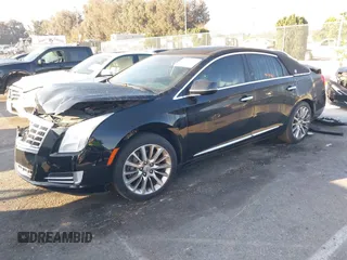 2014 Cadillac XTS Luxury with VIN 2G61M5S31E9290150, listed as a IAAI auction lot 41653055 with 174,553 mi miles and . Bid and sale history available at DreamBid. Image 2.