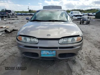 2001 Oldsmobile Aurora z VIN 1G3GR64H914122292, wystawiony jako Copart lot #75867154 z przebiegiem 120 977 mil mil oraz Szkody całkowita. Historia ofert i sprzedaży dostępna na DreamBid. Obrazek 5.