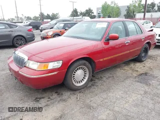 2000 Mercury Grand Marquis LS z VIN 2MEFM75W0YX658319, wystawiony jako IAAI lot #42028736 z przebiegiem 154 651 mil mil oraz . Historia ofert i sprzedaży dostępna na DreamBid. Obrazek 2.