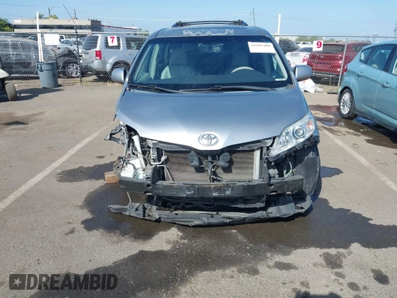 2011 Toyota Sienna XLE AAS with VIN 5TDYK3DC8BS156127, listed as a IAAI auction lot 42103980 with 129,851 mi miles. Bid and sale history available at carsss.com. Image 6.
