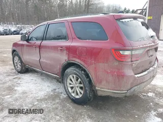 2015 Dodge Durango SXT with VIN 1C4RDJAG6FC888810, listed as a IAAI auction lot 41304507 with 125,936 mi miles and . Bid and sale history available at carsss.com. Image 3.