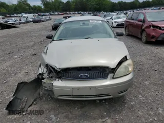 2006 Ford Taurus SE z VIN 1FAFP53U56A151555, wystawiony jako Copart lot #55227665 z przebiegiem 146 109 mil mil oraz Szkoda całkowita • Salvage title. Historia ofert i sprzedaży dostępna na DreamBid. Obrazek 5.